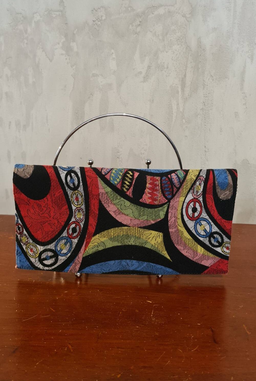 Cartera tipo sobre tela de colores PAULA DUQUE